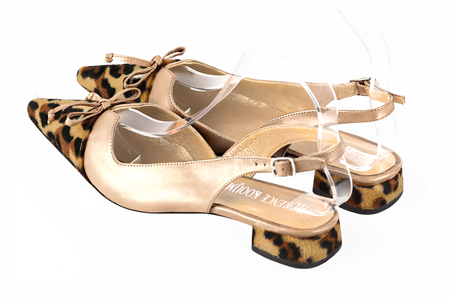 Safari black and gold women's open back shoes, with a knot. Pointed toe. Flat flare heels. Rear view - Florence KOOIJMAN